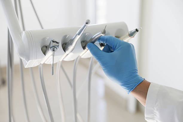 Professional Invisalign Clear Aligners technician working in DeKalb, IL